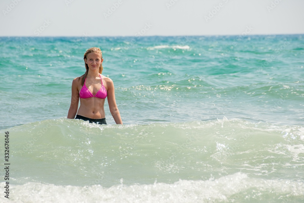 Sexy young girl swimming in sea Sexy young girl swimming in sea