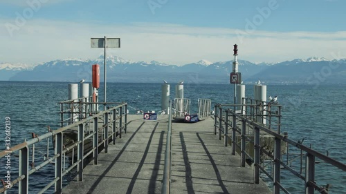 Still view of a pier of the city of Rolle