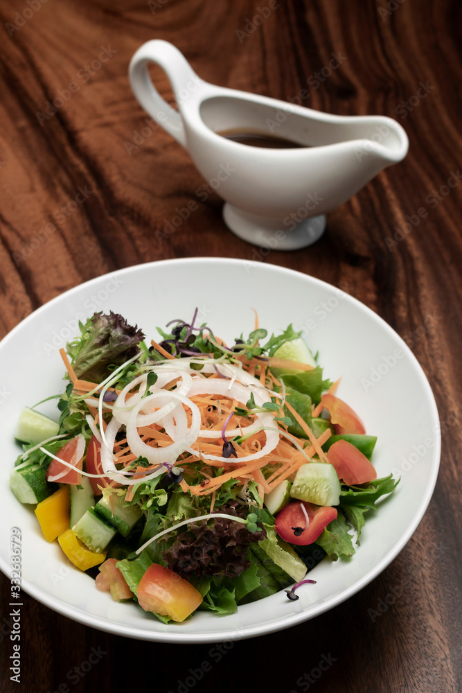 fresh organic mixed vegetable vegan Garden Salad with Vinaigrette sauce