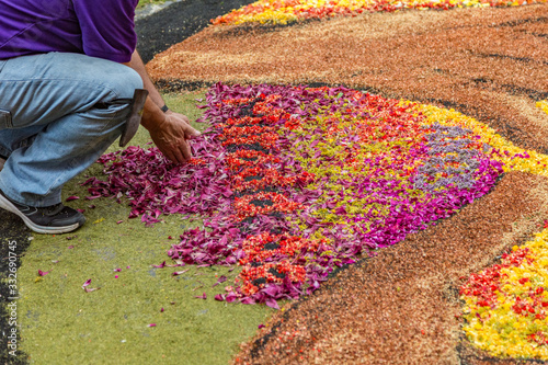la Orotava, Tenerife, Spain - June 27, 2019. Beautiful flower carpets in La Orotava during Corpus Christi. Famous religious event and competition of folk art. Warm summer evening and joyful visitors