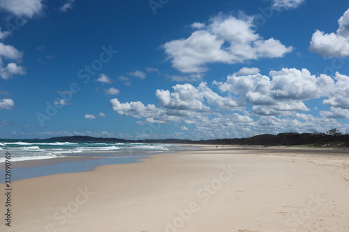 Long and remote beach with only few people walking © Alberto
