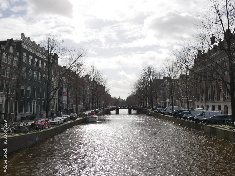 Amsterdam Canal with Cars Lined Up In Street