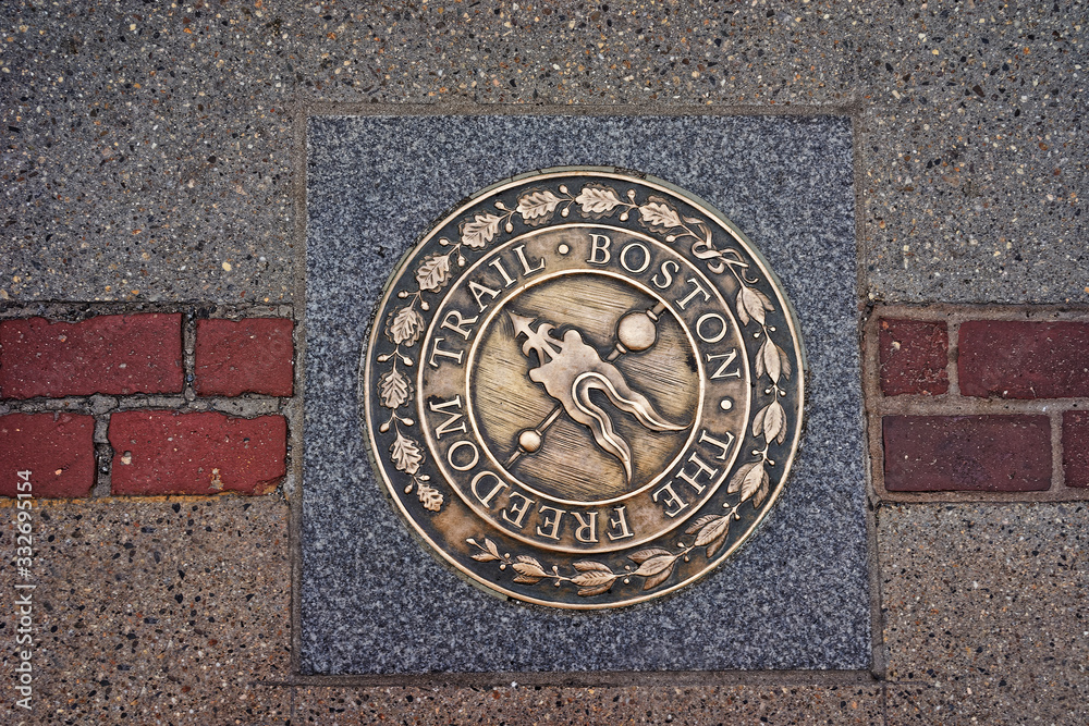 Freedom Trail symbol on the road in downtown Boston