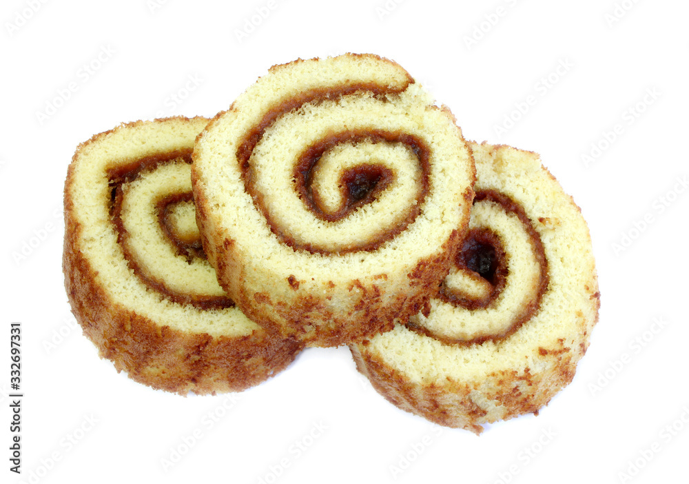 Swiss sweet roll with jam isolated, slices of homemade sponge roll cake isolated Swiss sweet roll with jam isolated, slices of homemade sponge roll cake isolated