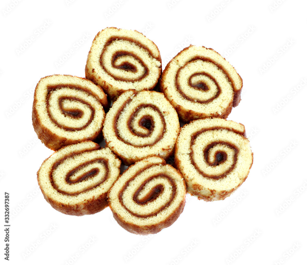Swiss sweet roll with jam isolated, slices of homemade sponge roll cake isolated Swiss sweet roll with jam isolated, slices of homemade sponge roll cake isolated
