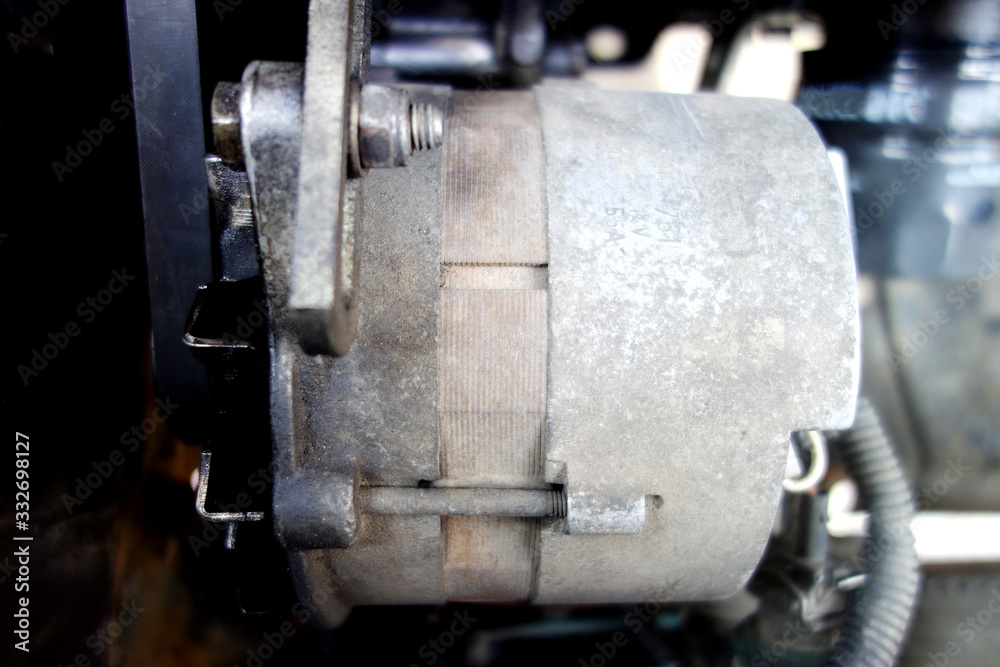 Worn alternator in old car Worn alternator in old car