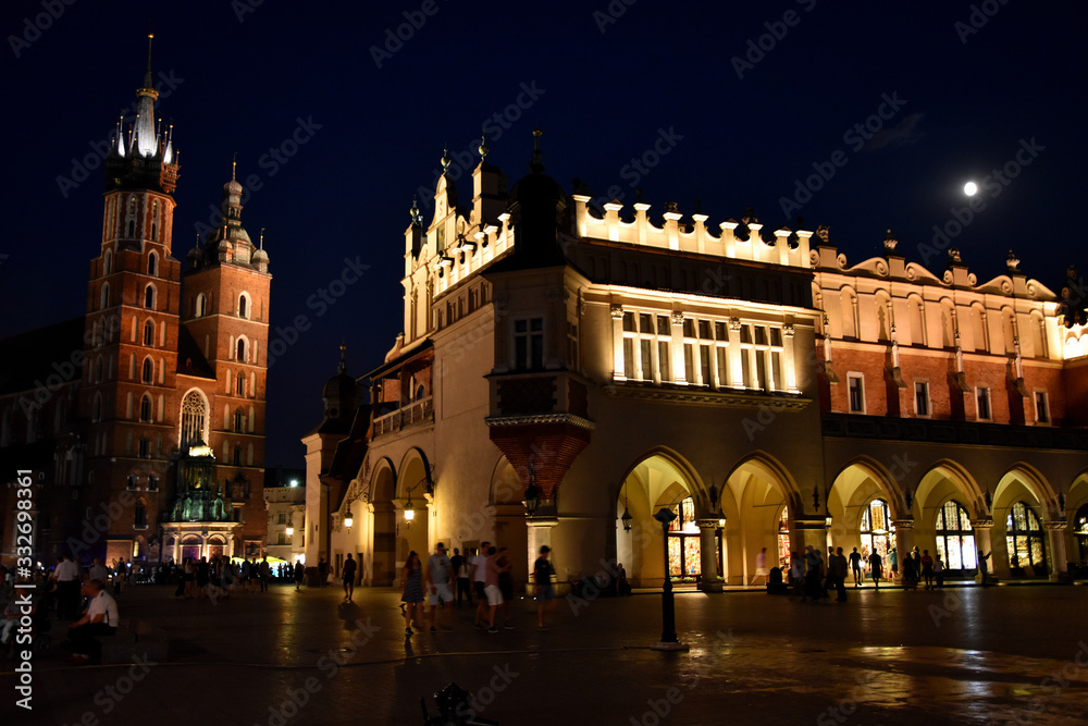 Night backlit Krakow city Market square in the summer