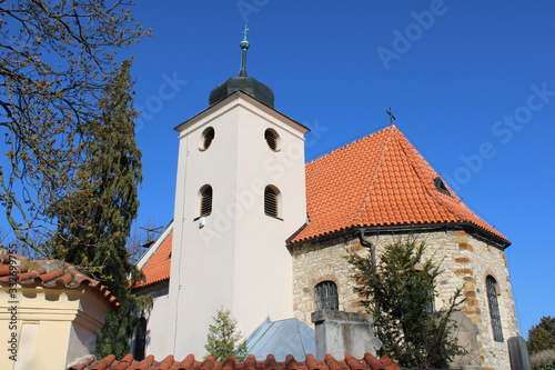 Fototapeta Naklejka Na Ścianę i Meble -  The oldest church in Central Europe in Bohemia, with an endless blue sky, without clouds