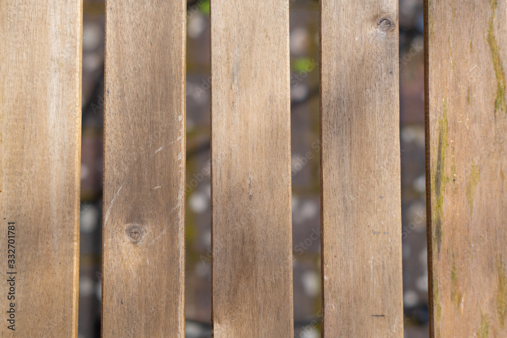 Plain wooden background illuminated by sunlight Plain wooden background illuminated by sunlight