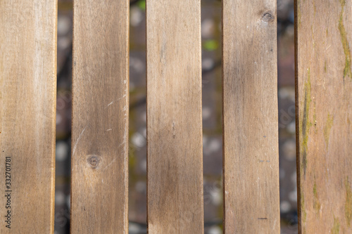 Plain wooden background  illuminated by sunlight