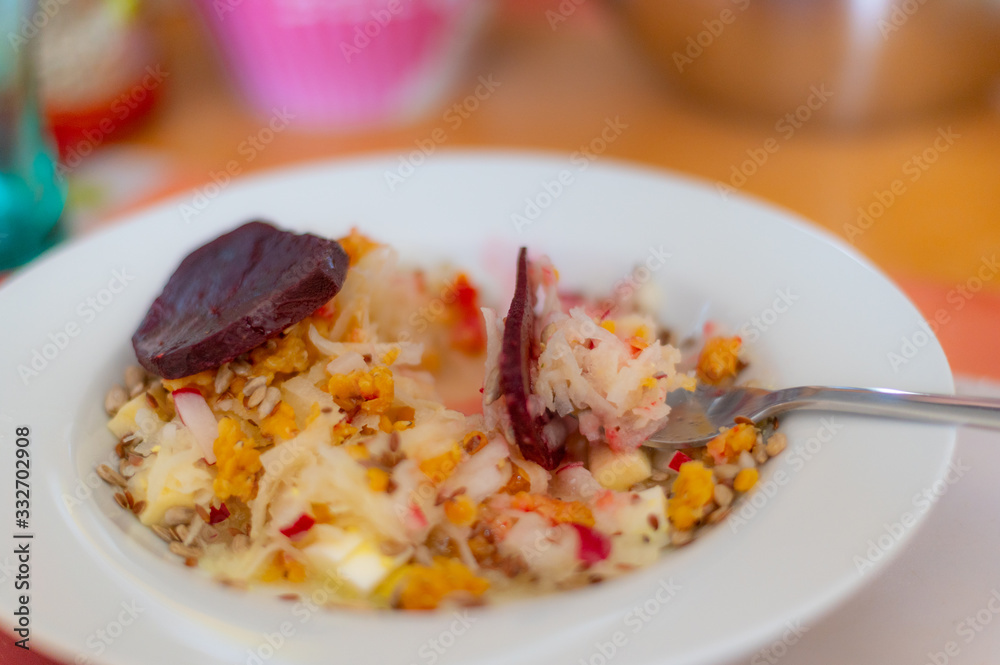 delicious salad on a fork with kohlrabi, beetroot, lentils and cereals delicious salad on a fork with kohlrabi, beetroot, lentils and cereals