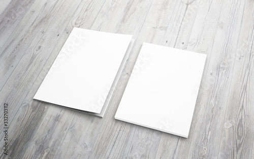 Blank folder and letterhead on wooden desk background as template for your design presentation.