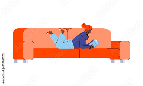 Cartoon woman reading a book lying on her stomach on orange sofa