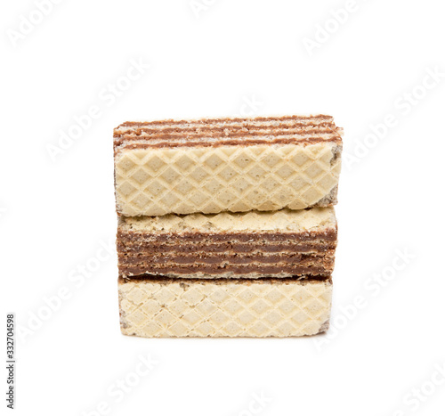 Crispy wafers with creamy hazelnut filling isolated on white background