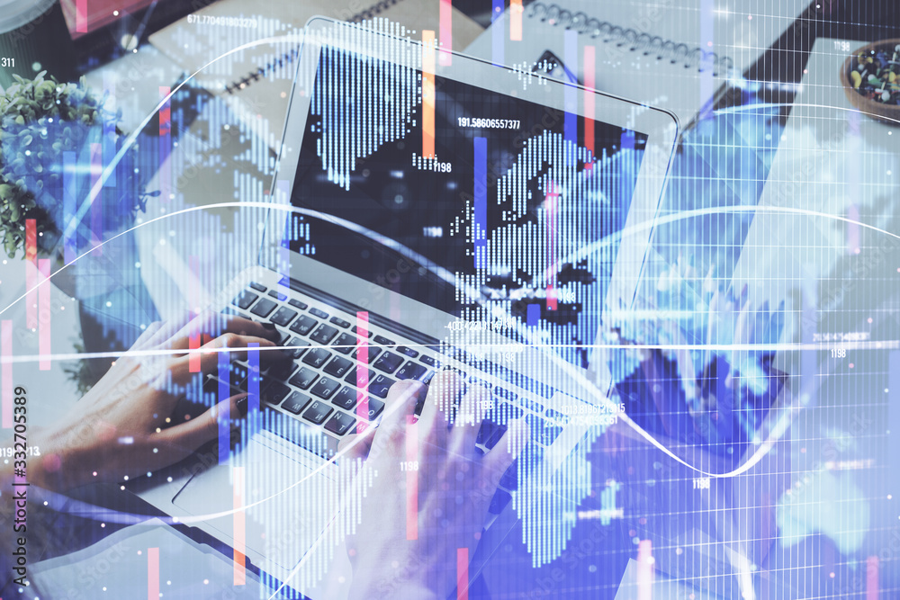 Double exposure of businessman working on laptop on background. International business hologram in front. Concept of success. Double exposure of businessman working on laptop on background. International business hologram in front. Concept of success.