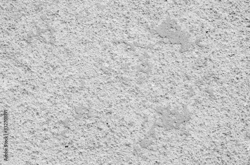 Old gray plaster on wall