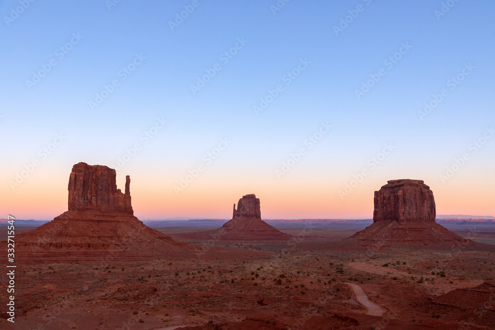 Beautiful sunset over famous Buttes of Monument Valley on the border between Arizona and Utah, USA