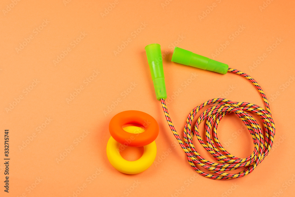 Fototapeta premium Sport equipment on orange background.