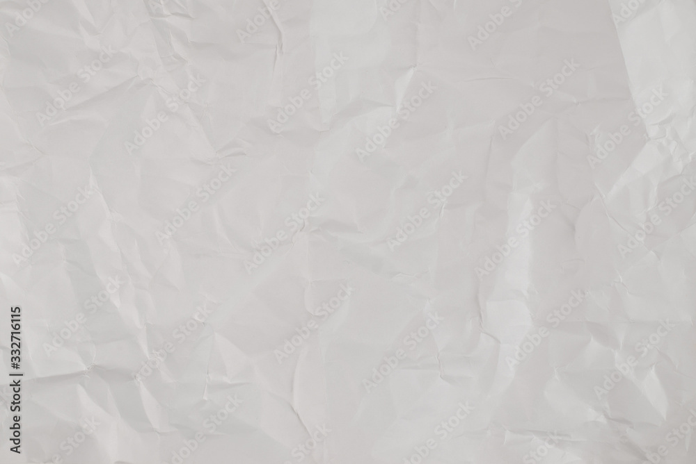 Obraz premium Crumpled white paper background.