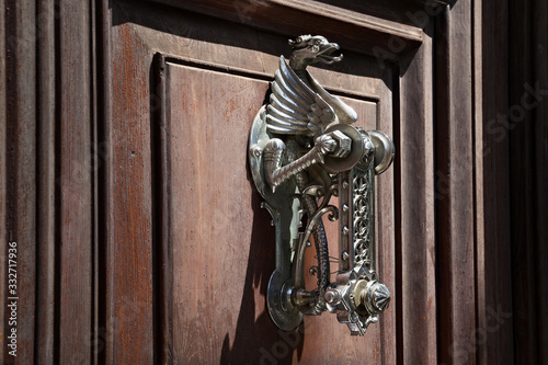 Old vintage doorknob in shape of the dragon.