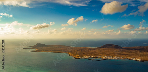 island with its small port seen from the air