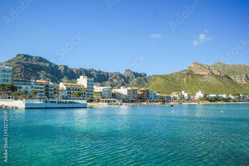 Tranquil harbour with boats in Port de Pollenca, Mallorca, Spain