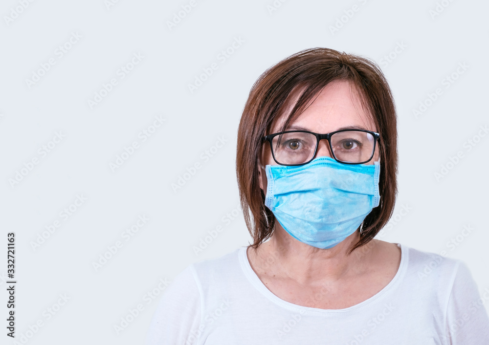 Medical mask background white middle age 50 plus woman coronavirus covid 19 glasses face Medical mask background white middle age 50 plus woman coronavirus covid 19 glasses face