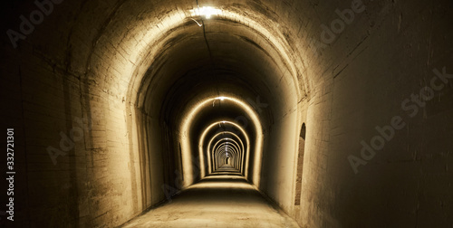 lighted and dingy tunnel