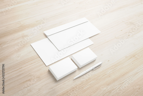 Blank envelopes and business cards on wooden desk as identity concept for branding design presentation, promotion etc.