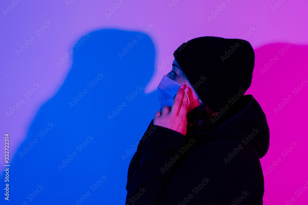 Medical mask neon blue pink purple background woman coronavirus covid 19 street evening black
