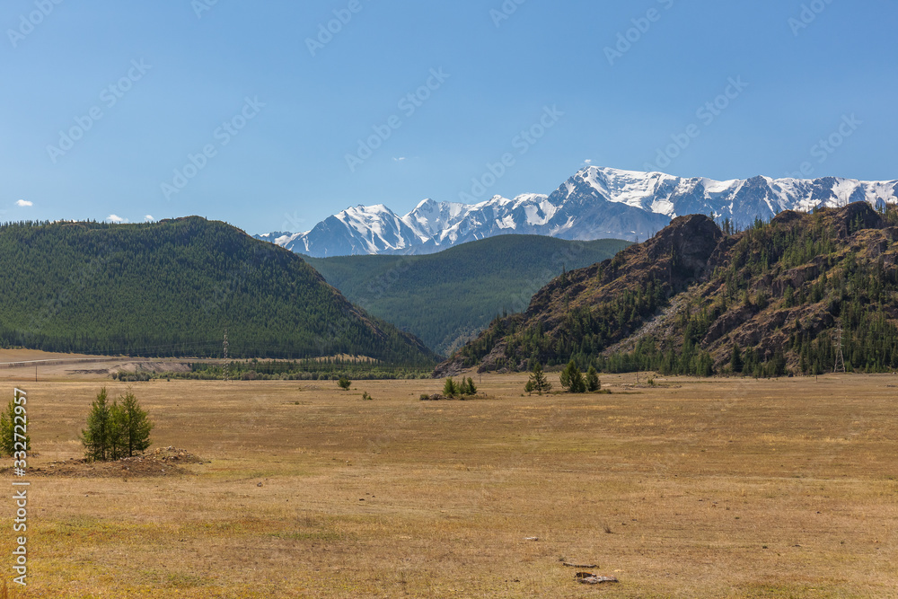 View of Belukha Mountain. Russia. Snow mountains of Altai. Belukha the highest peak of Siberia