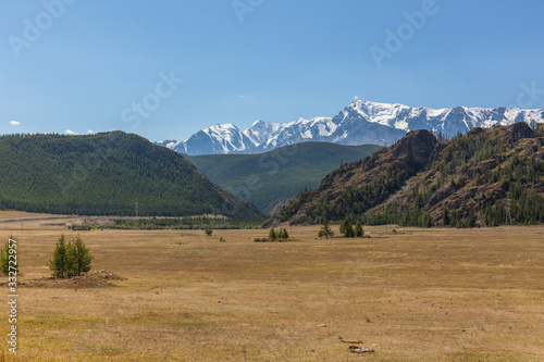 View of Belukha Mountain. Russia. Snow mountains of Altai. Belukha the highest peak of Siberia