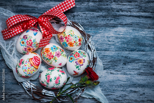 Decoupage decorated Easter eggs with flower pattern