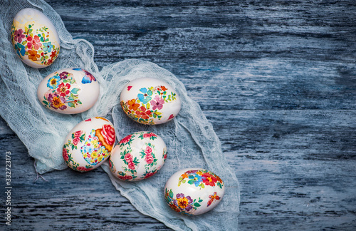 Decoupage decorated Easter eggs with flower pattern