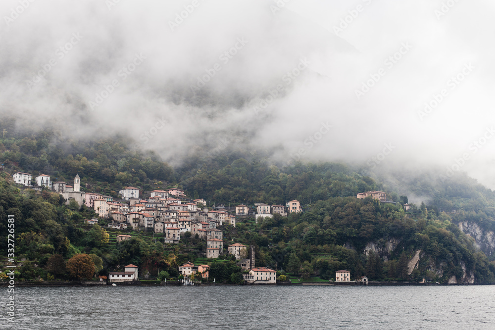 cloudy village in the mountains panoramic view