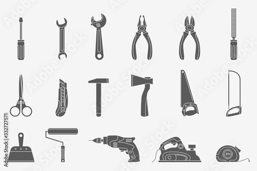 Work tool Icons set - Vector silhouettes of hammer, wrench, screwdriver, pliers, spanner, drill, axe and knife for the site or interface