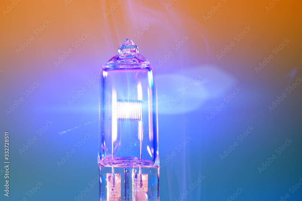 Electric light bulb with smoke photographed in the studio