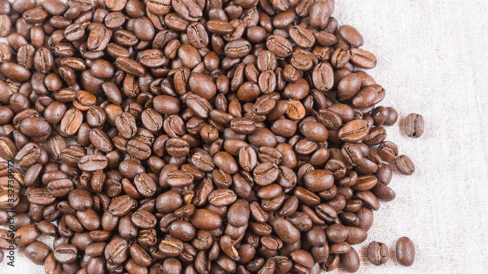 coffee beans.coffee beans sprinkled on fabric. coffee beans.coffee beans sprinkled on fabric.