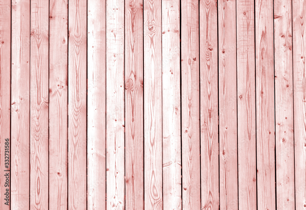 Fence made of wooden planks in red tone. Fence made of wooden planks in red tone.