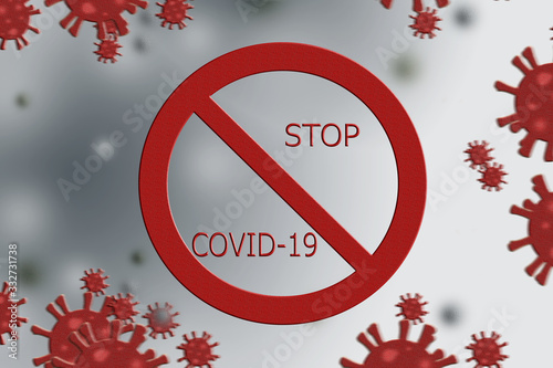 Stop COVID-19 closeup.Red Cronavirus on a silver background photo