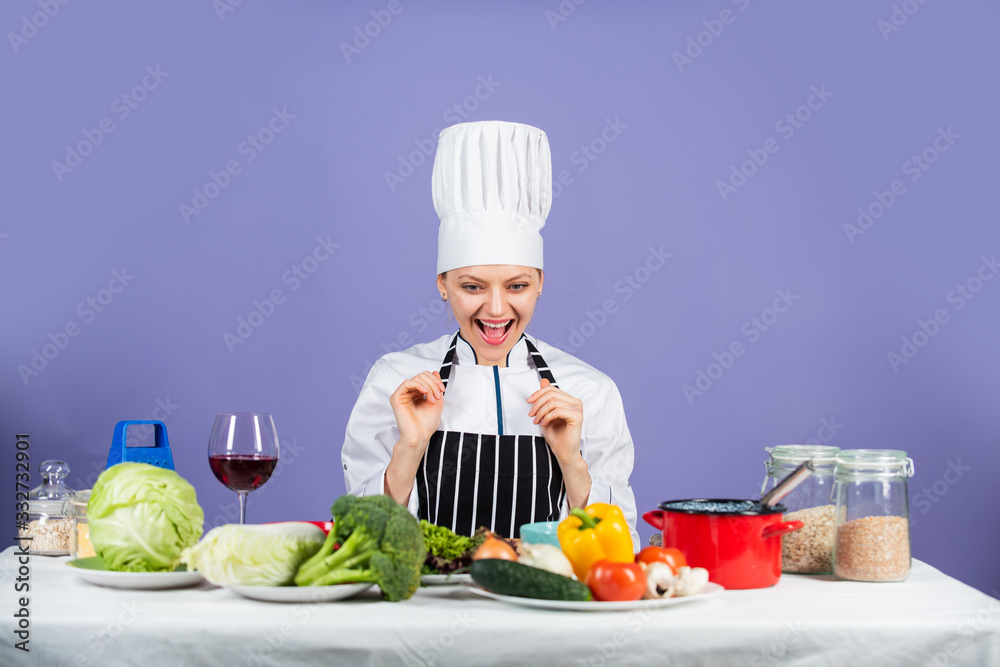 Be All You Can Be. happy chef cooking vegetables. healthy food and diet. woman housewife in cook hat and apron. fresh preparing. full of vitamin. natural and organic. restaurant kitchen lifestyle Be All You Can Be. happy chef cooking vegetables. healthy food and diet. woman housewife in cook hat and apron. fresh preparing. full of vitamin. natural and organic. restaurant kitchen lifestyle