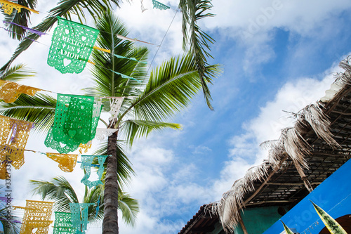 Colourful Mexican flags decorating the town of Sayulita, Mexico © Patricia Chumillas