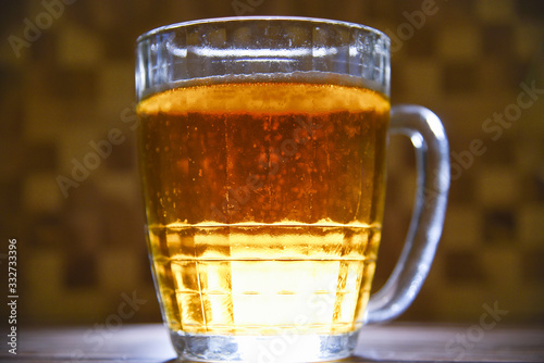 Soviet mug of cold light beer photo