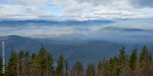 Misty mountain landscape. Panoramic view from Green Ridge Lookout in Central Oregon.