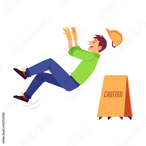 Work injury of a man builder, a worker in a helmet slips and falls on a slippery floor.