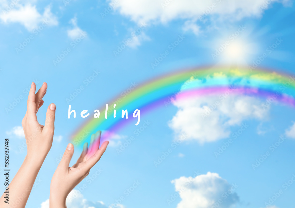Woman and rainbow as source of healing energy on sunny day, closeup Woman and rainbow as source of healing energy on sunny day, closeup