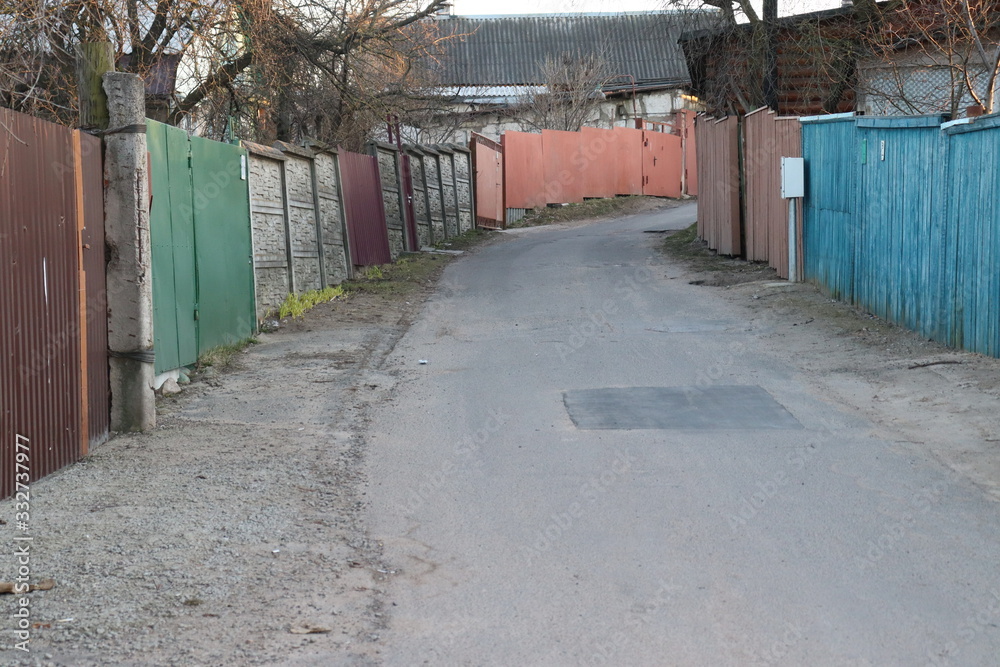 Fototapeta premium rural road in russian typcial village street
