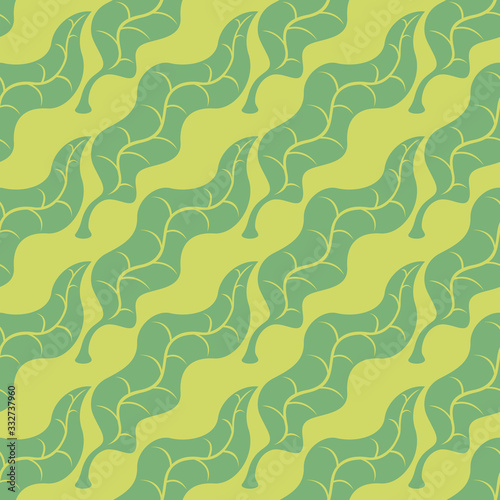 vector multi green leaves seamless pattern on yellow
