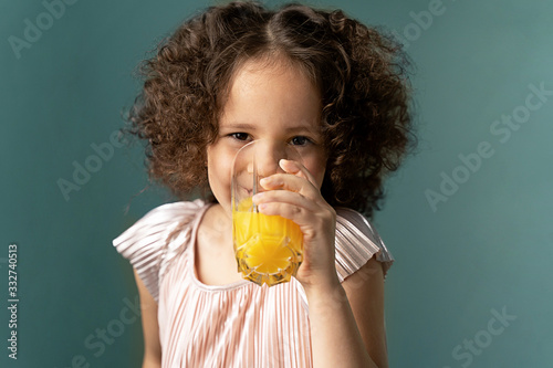 funny curly girl laughs and drink