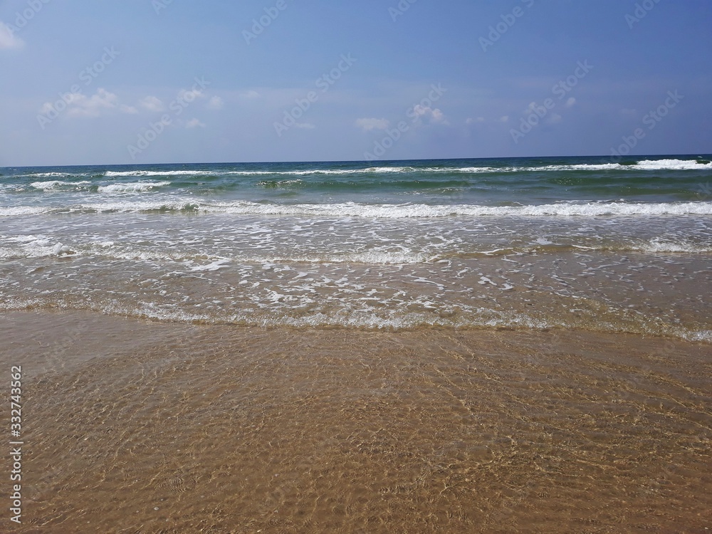 Clear water of the Mediterranean Sea, washing the shore of Netanya in Israel.